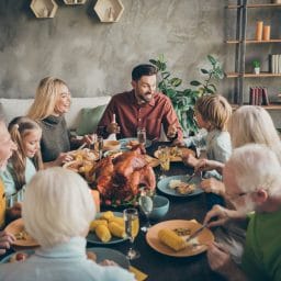 Family enjoying a big holiday meal.